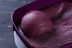 Close-up of frozen Brazilian açaí in a purple box. Top view
